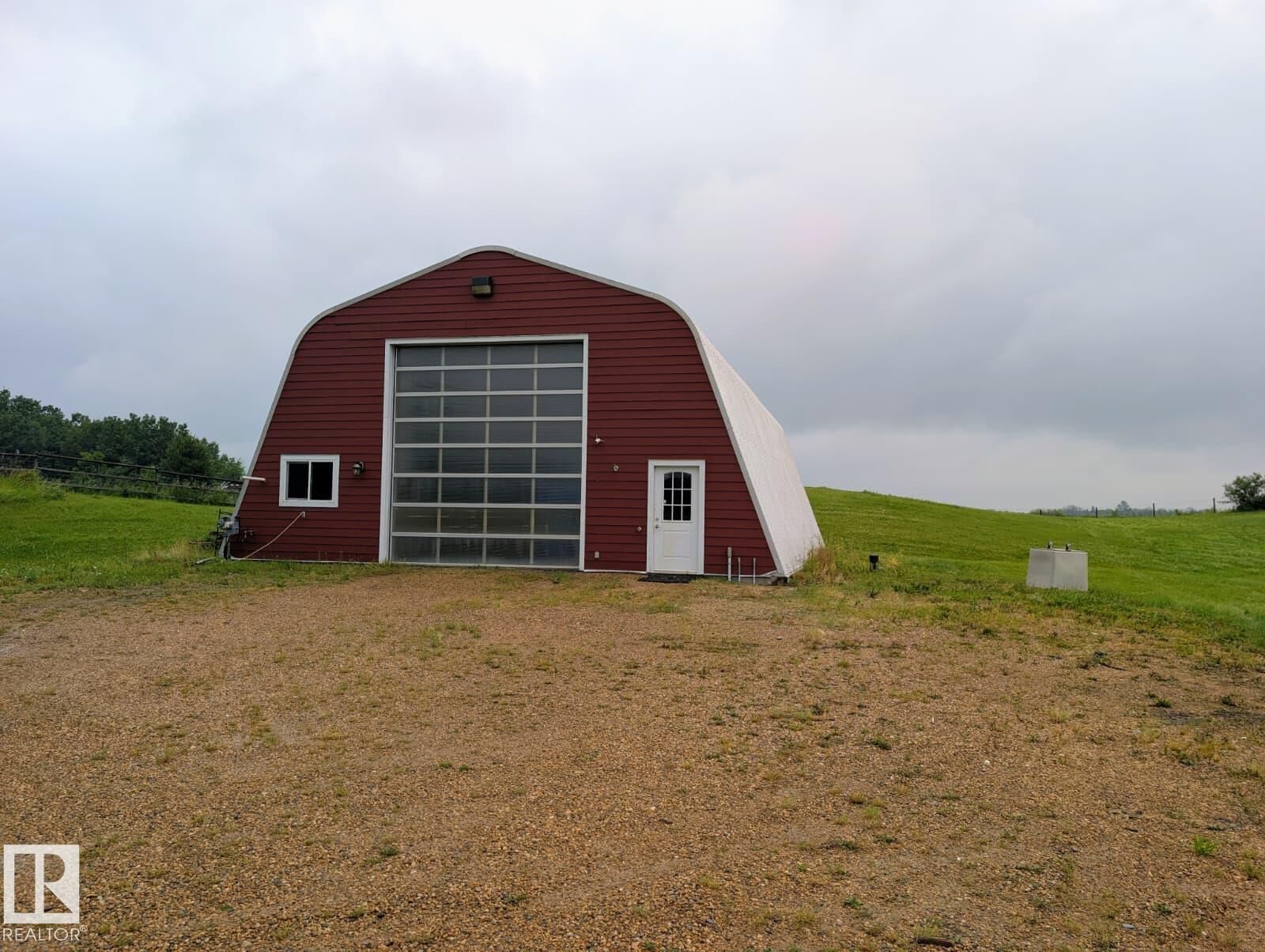Property Photo:  210-50125 Rge Rd 233  AB T4X 0L2 