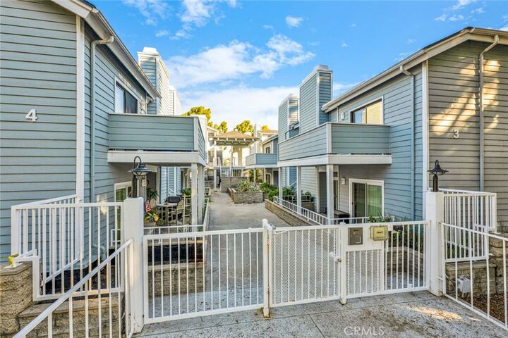 Property Photo:  16960 Algonquin 3-204  CA 92649 