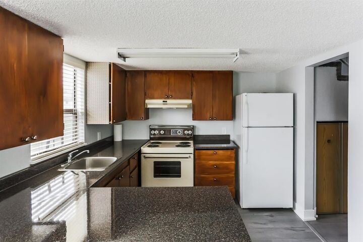 Property Photo: 13316 71B Avenue 204 BC V3W 7Z4