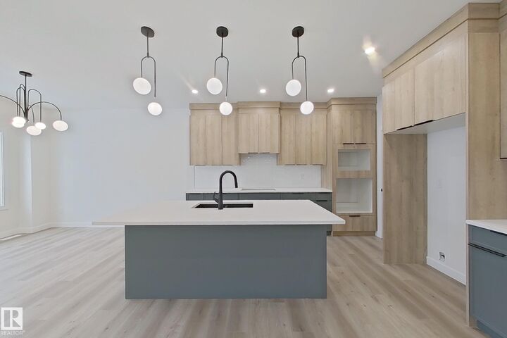 Property Photo: 3158 Magpie Way NW AB T5S 0K8