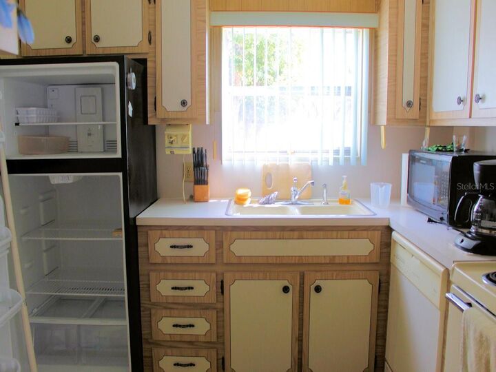 Property Photo:  2E Pindo Palm Street E  FL 33770 