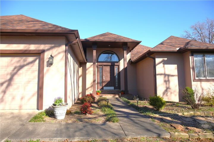 Property Photo:  2421 NW Rita Way  AR 72712 
