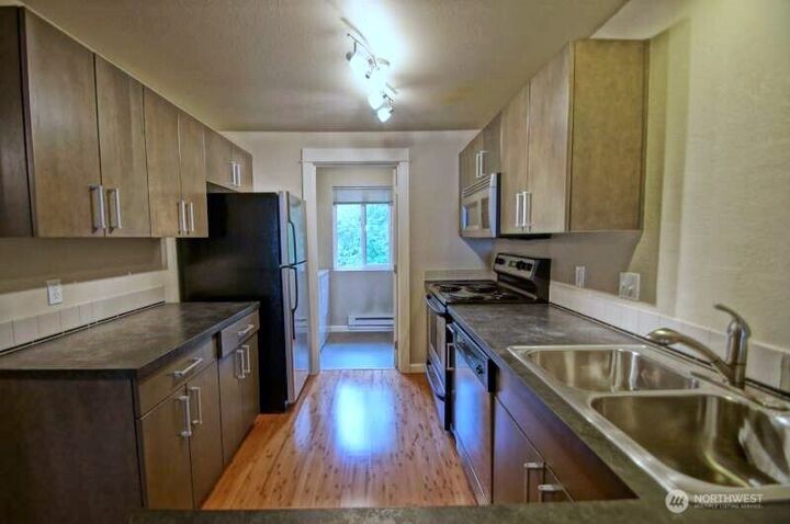 Property Photo:  718  Kirkland Circle B302  WA 98033 