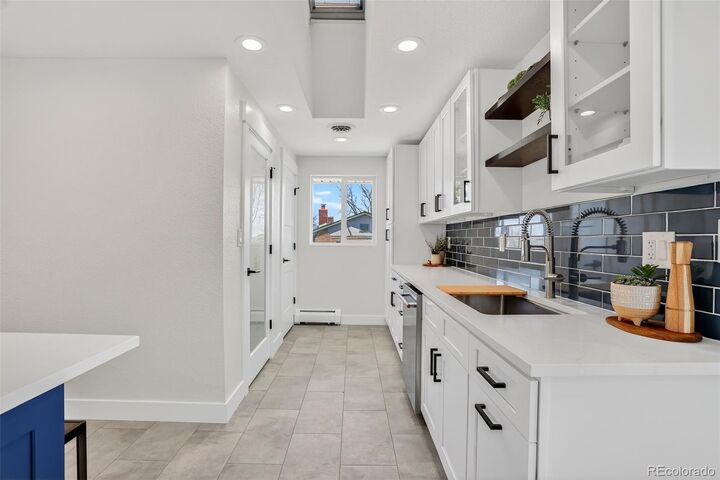 Property Photo:  3100 W Denver Place  CO 80211 