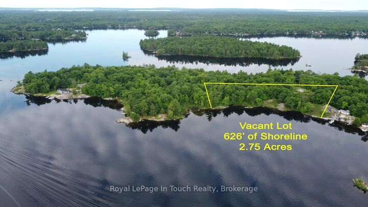 1958 Six Mile Lake Shore Island — photo 1