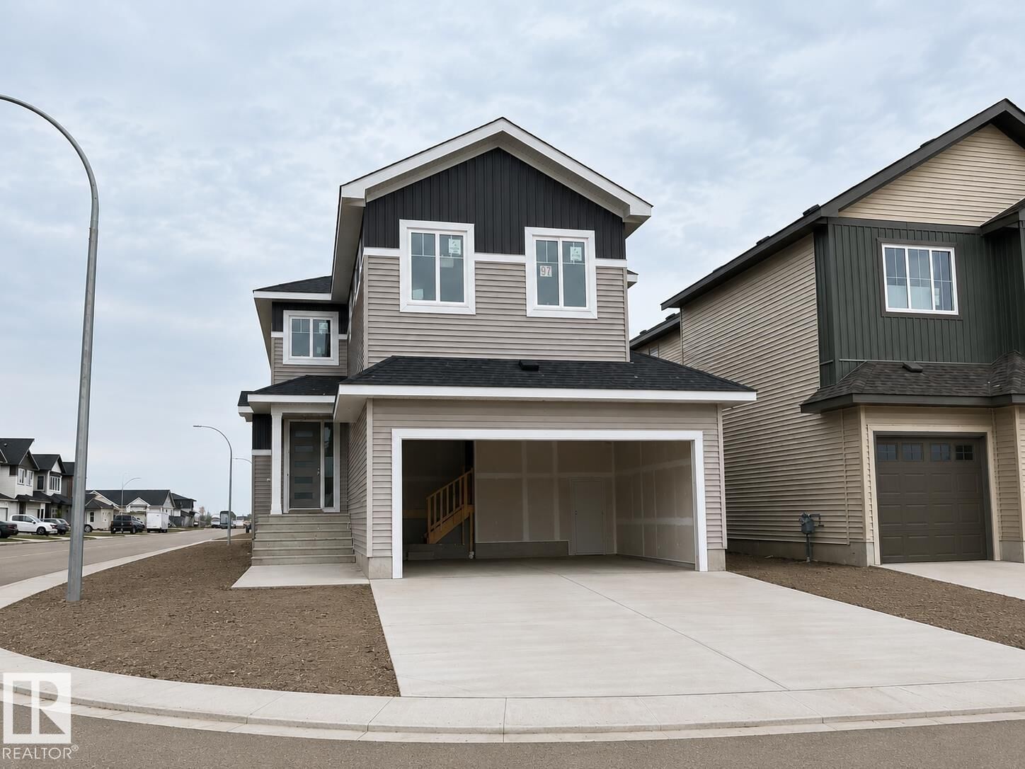 Property Photo: 97 Mockingbird Crescent AB T8L 1P3