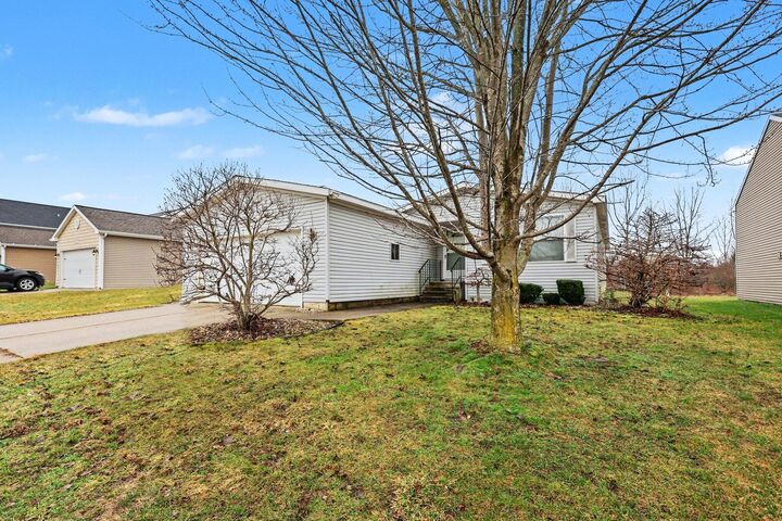 Property Photo:  6589 Moss Lake Drive  MI 49426 