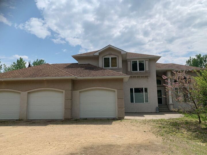 Property Photo: 29 594028 Range Road 125 AB T7S 1P1