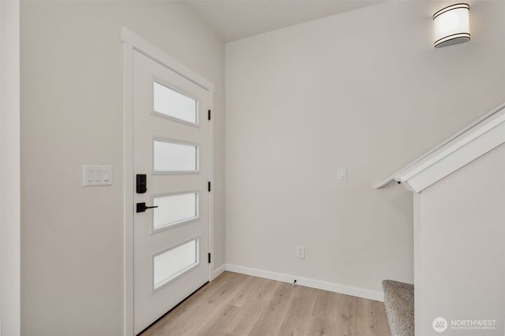 Property Photo:  12742  121st Street Ct E 104  WA 98374 