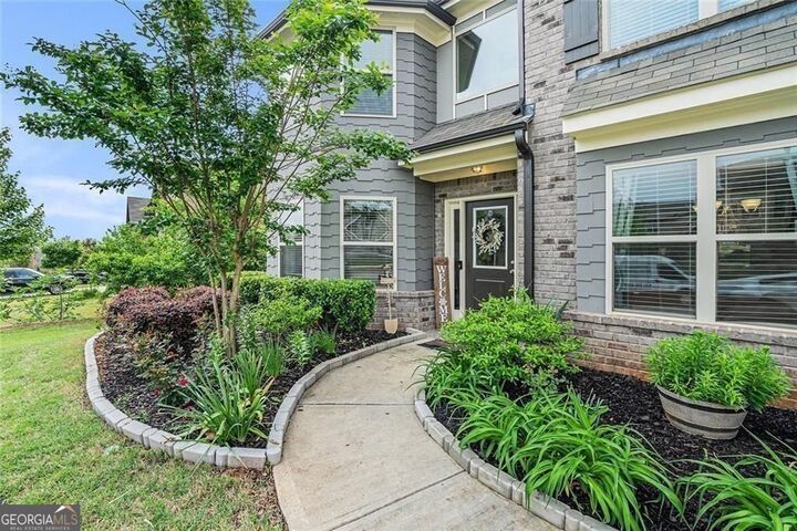 Property Photo:  3399 In Bloom Way  GA 30011 