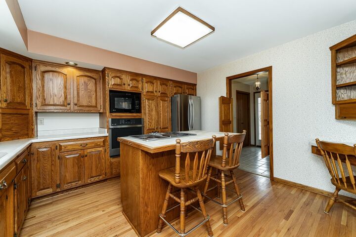 Property Photo:  1718 22nd Avenue NE  MN 55906 