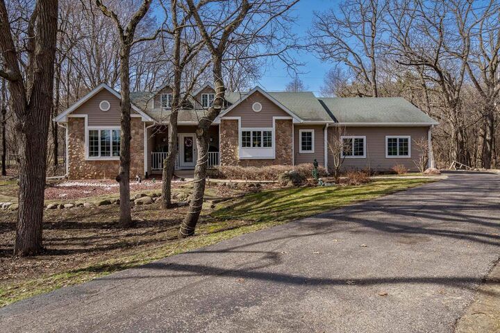 Property Photo:  4455 Pheasant Run  WI 53546 