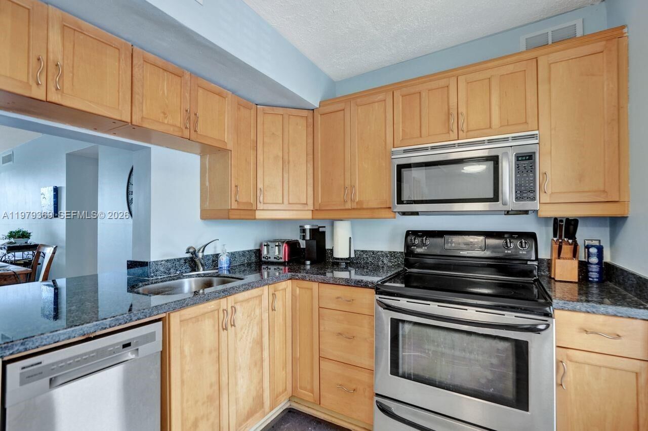 Property Photo:  2651 S Course Dr 203  FL 33069 