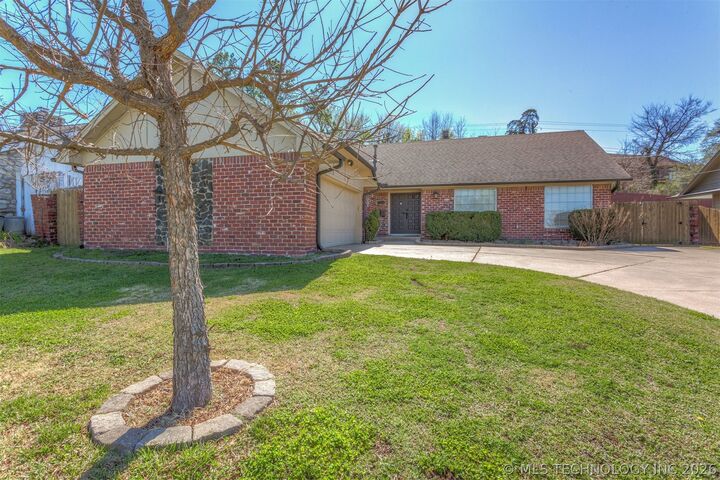 Property Photo:  7634 E 58th Place  OK 74145 