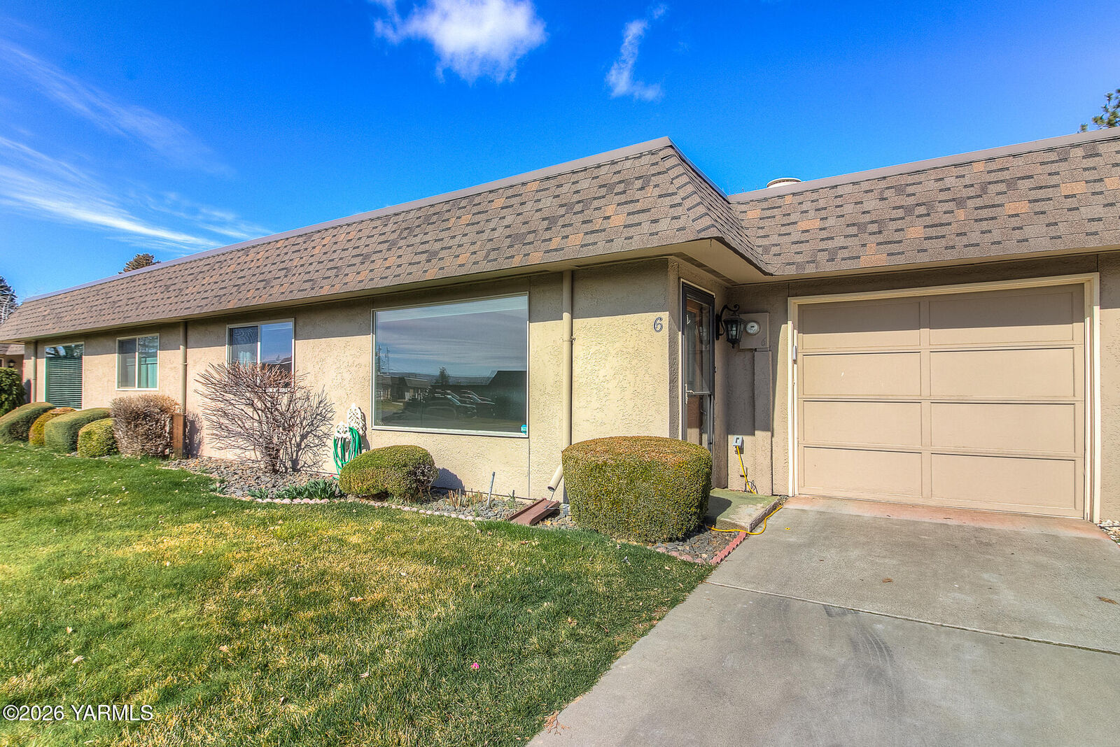Property Photo:  100 N 60th Ave  WA 98908 
