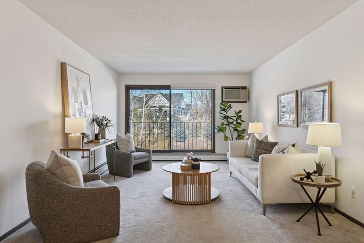 Property Photo:  205 Barry Avenue S 303  MN 55391 