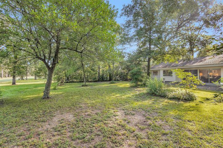 Property Photo:  6 Winged Foot Drive  TX 77304 