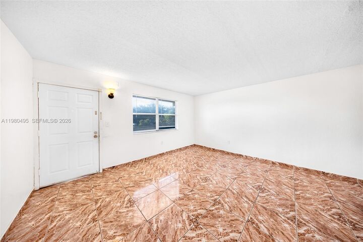 Property Photo:  301 NW 177th St 201  FL 33169 