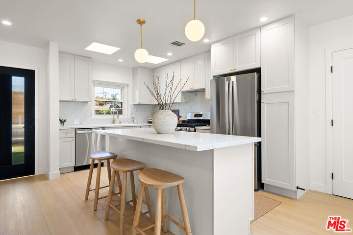 Property Photo: 23649 Emelita St CA 91367