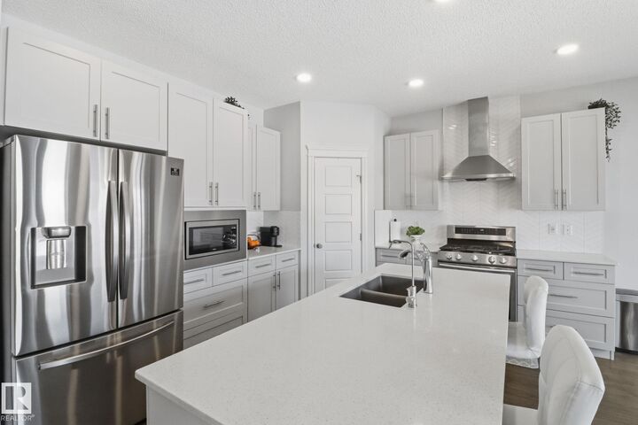 Property Photo: 812 176 Street SW AB T6W 2X3