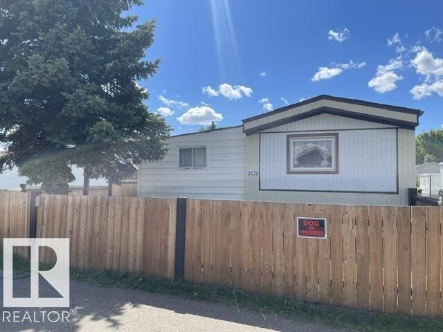 1121 Lakeland Village — photo 1