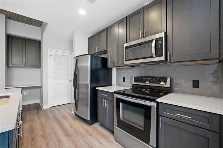 Property Photo:  400 W Peachtree Street NW 1908  GA 30308 