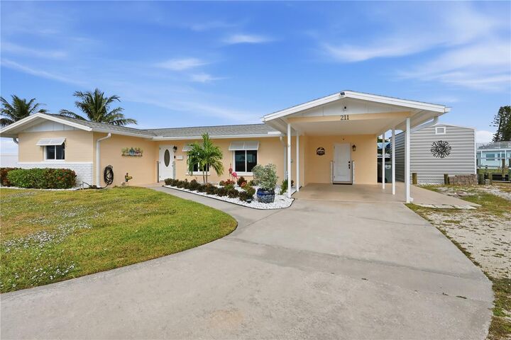 Property Photo:  211 21st Street NE  FL 34208 