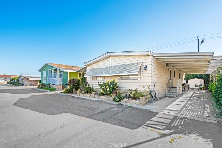 Property Photo:  6741 Lincoln 15  CA 90620 