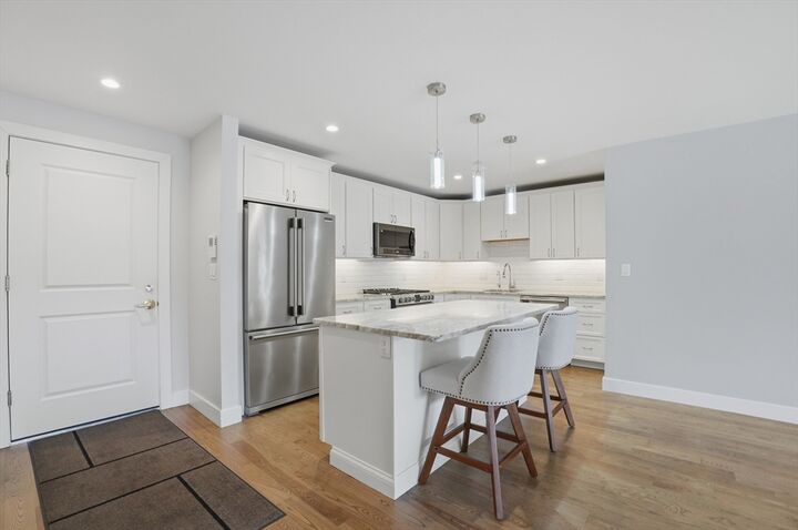 Property Photo:  9 Independence Ave 102  MA 02184 