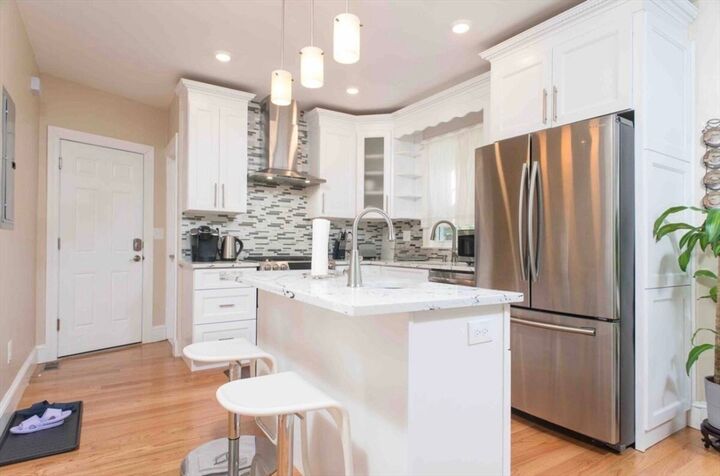 Property Photo: 40 Eddy St 40 MA 02465