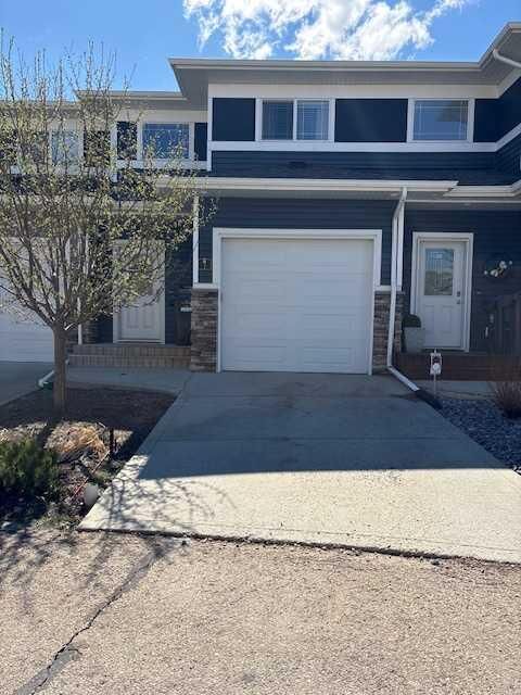 Property Photo: 5301 Windward Place 7 AB T4S 0H5