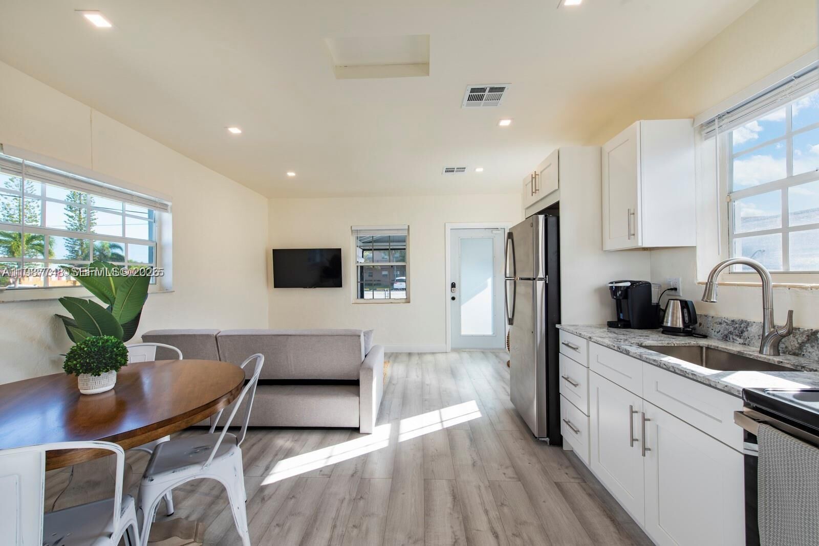 Property Photo:  115 SE 2nd 1-2  FL 33009 