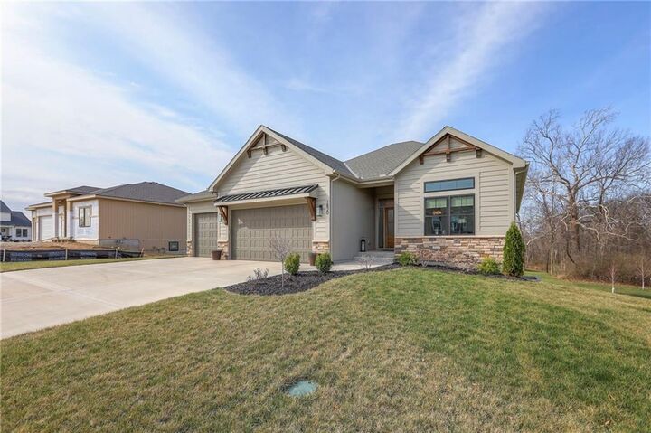 Property Photo:  1820 Homestead Drive  MO 64068 