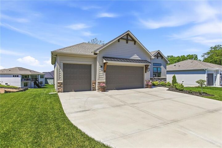 Property Photo:  1820 Homestead Drive  MO 64068 