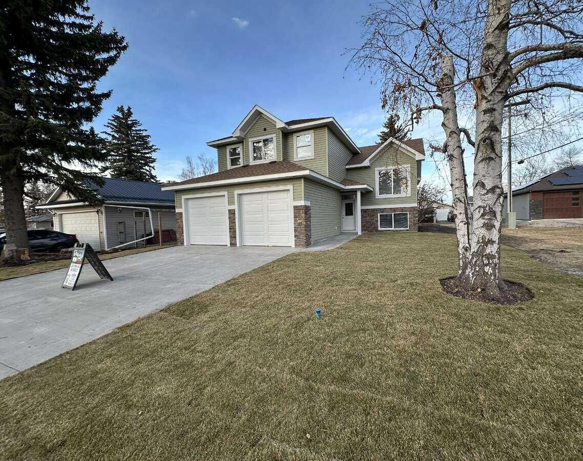 Property Photo: 5518 52 Street AB T4H 1H8