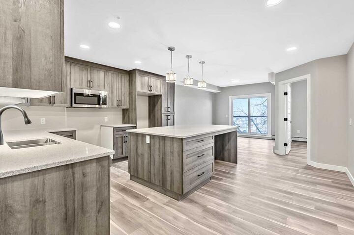 Property Photo: 97 Station Drive 405 AB T4S 0S6