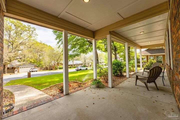 Property Photo:  10011 Hollowbrook Dr  FL 32514 