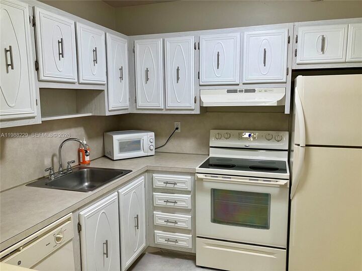 Property Photo:  5681 SW 2nd Ct 105  FL 33068 