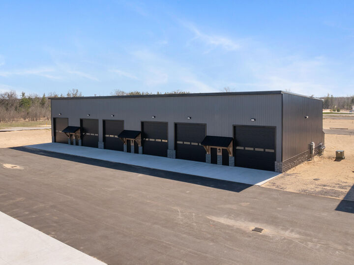 Property Photo:  5384 Commerce Boulevard  MI 49749 
