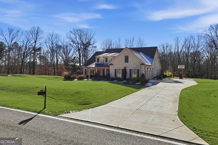 Property Photo:  5747 Wheeler Road  GA 30011 