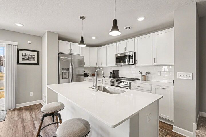 Property Photo:  10502 Weston Way N  MN 55369 