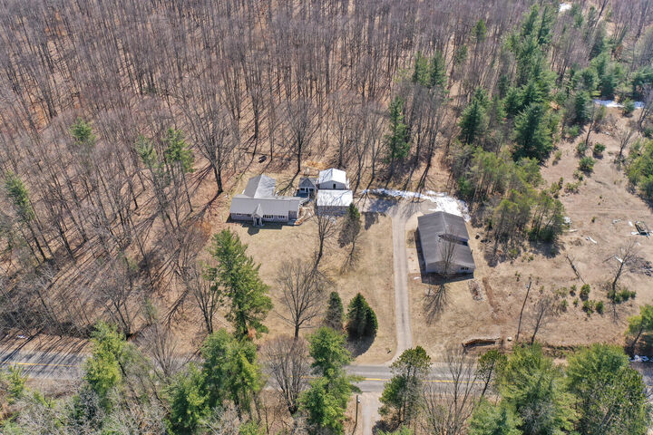 Property Photo:  10319 E 4 1/2 Mile Road  MI 49656 