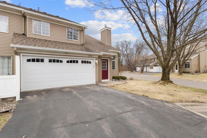 Property Photo:  610 85th Lane NW 8nw  MN 55433 