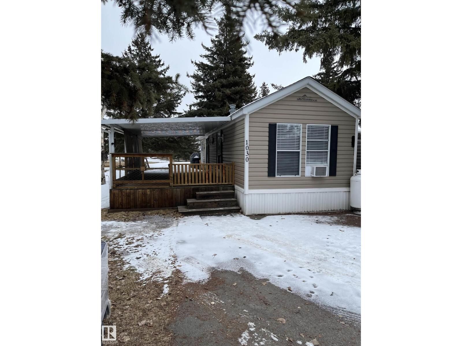 Property Photo:  1030 35468 Range Road 30  AB T4G 0M3 