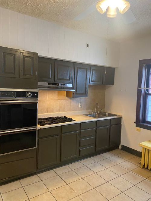 Property Photo: 10214 S State Street 1 IL 60628