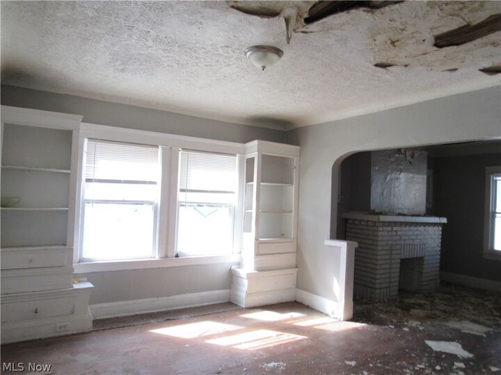 Property Photo:  1427 E 133rd Street  OH 44112 