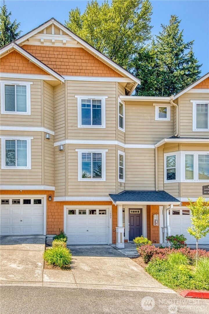 Property Photo:  5583  Lakemont Boulevard SE 1603  WA 98006 