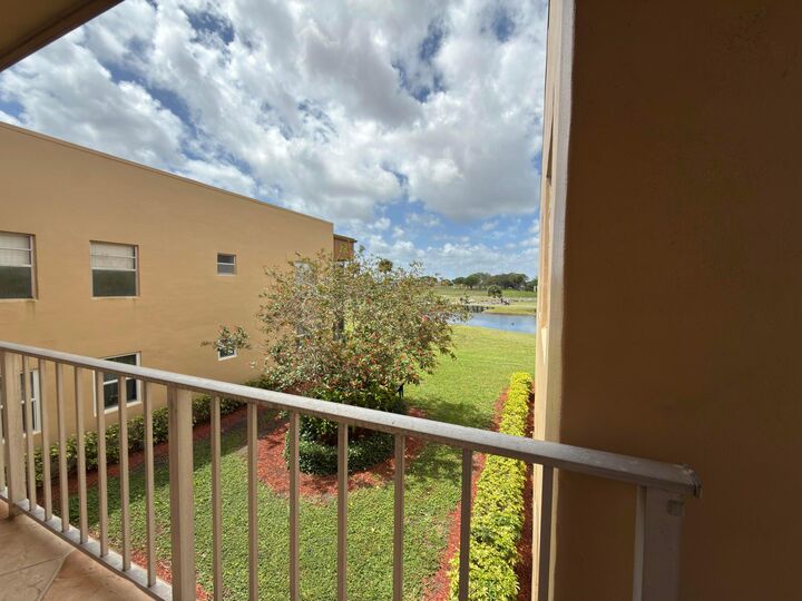 Property Photo:  465 Flanders J  FL 33484 