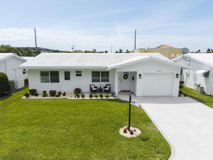 Property Photo:  2390 SW 14th Avenue  FL 33426 