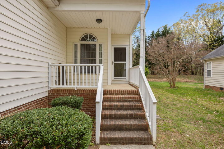 Property Photo:  409 Rose Petal Run  NC 27587 